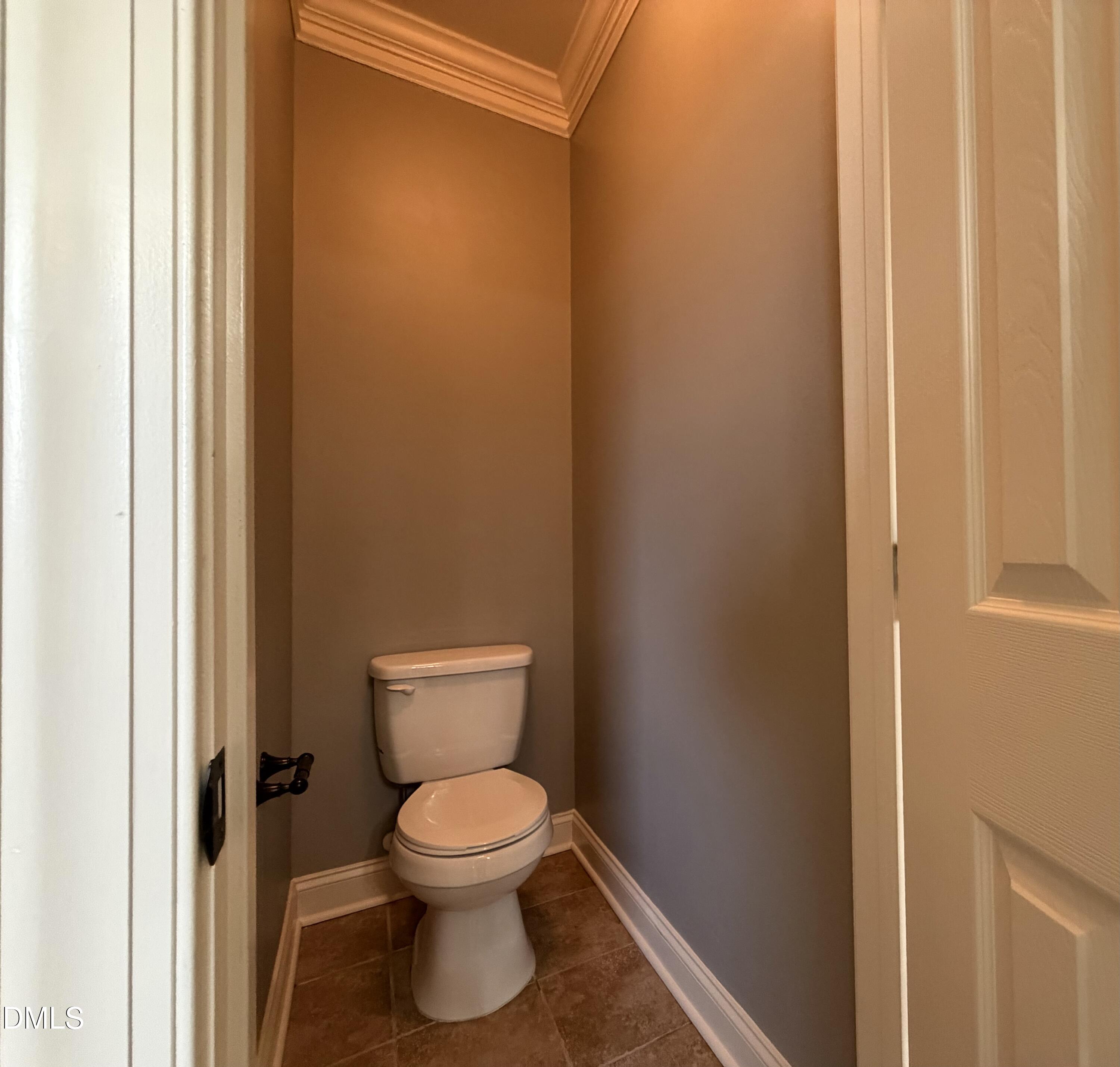 204 Blair Hills Road Wendell, NC 27591 - Photo 30 of 52 a white toilet sitting next to a shower