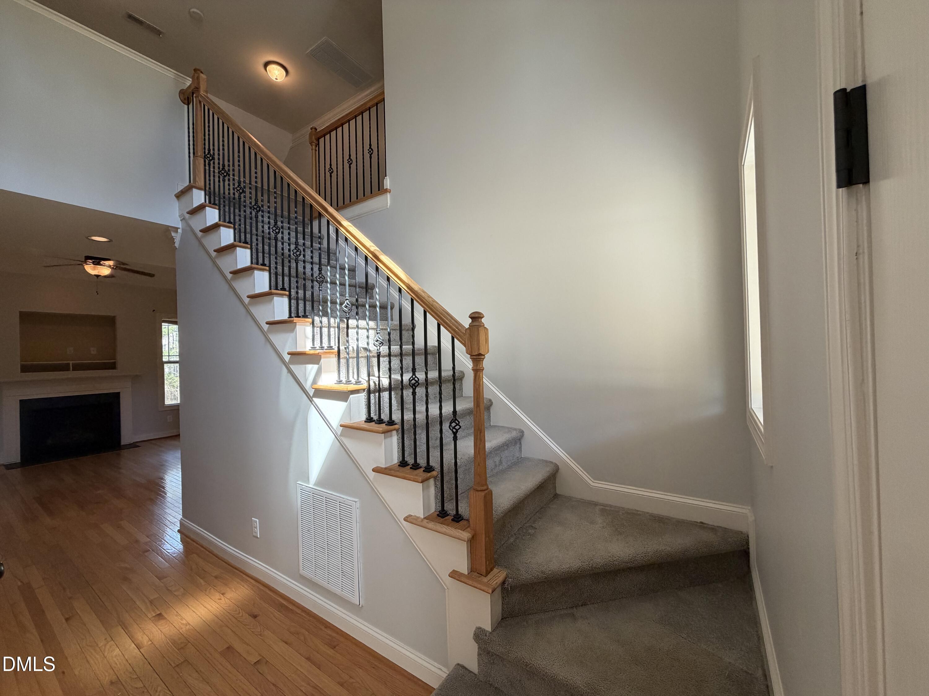 204 Blair Hills Road Wendell, NC 27591 - Photo 32 of 52 a view of entryway and hall with wooden floor