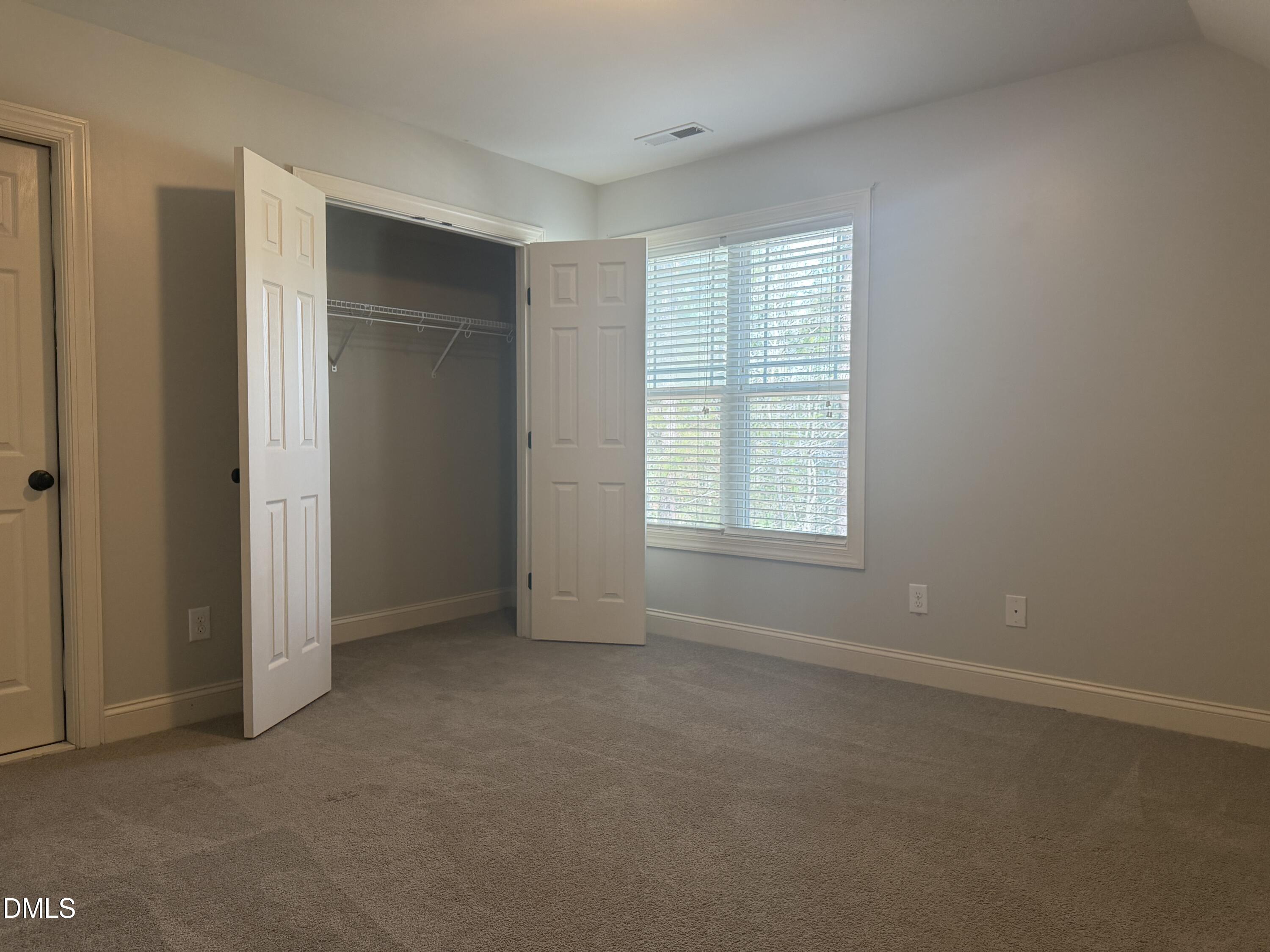 204 Blair Hills Road Wendell, NC 27591 - Photo 38 of 52 an empty room with windows