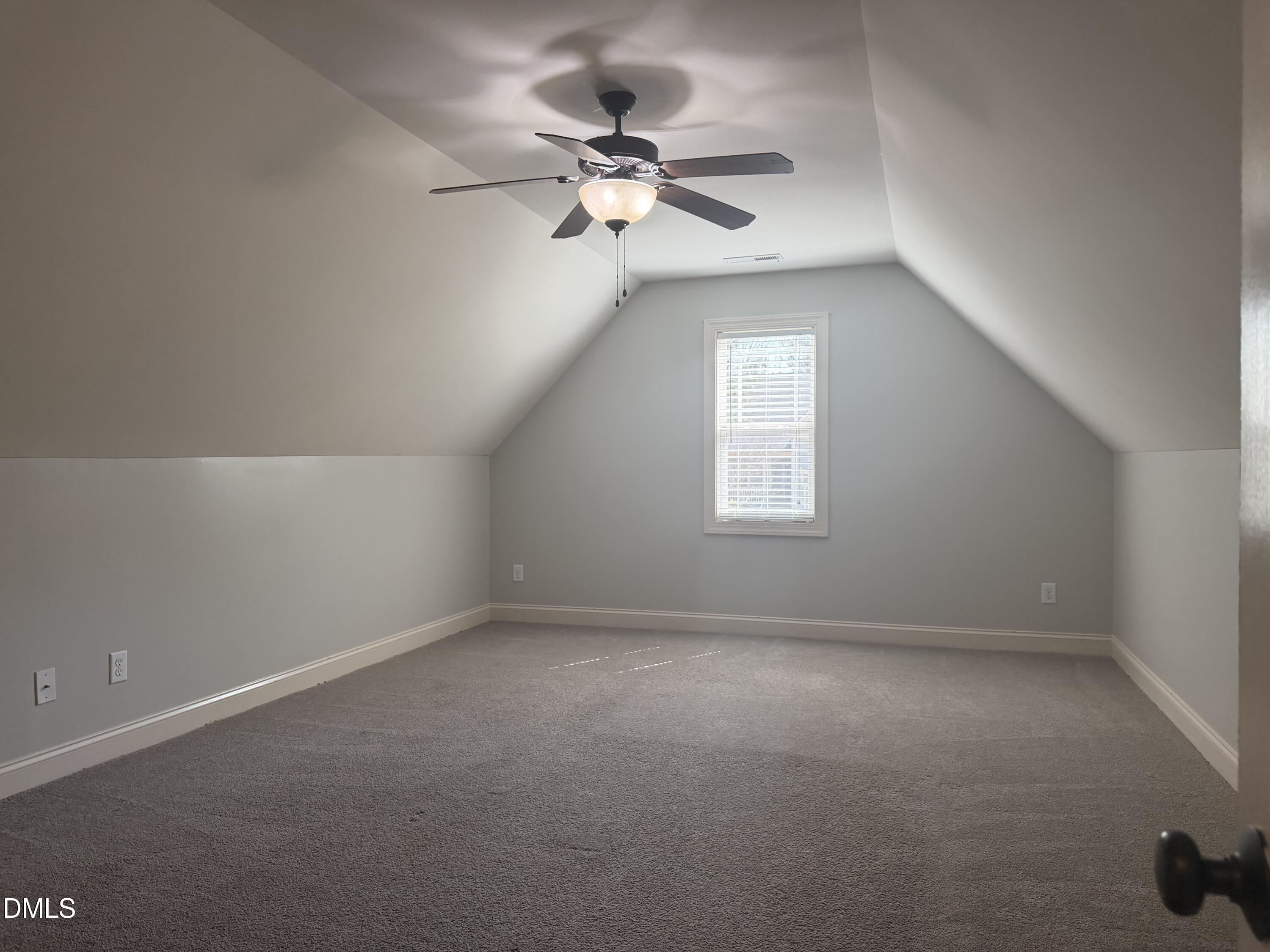 204 Blair Hills Road Wendell, NC 27591 - Photo 42 of 52 an empty room with closet and windows