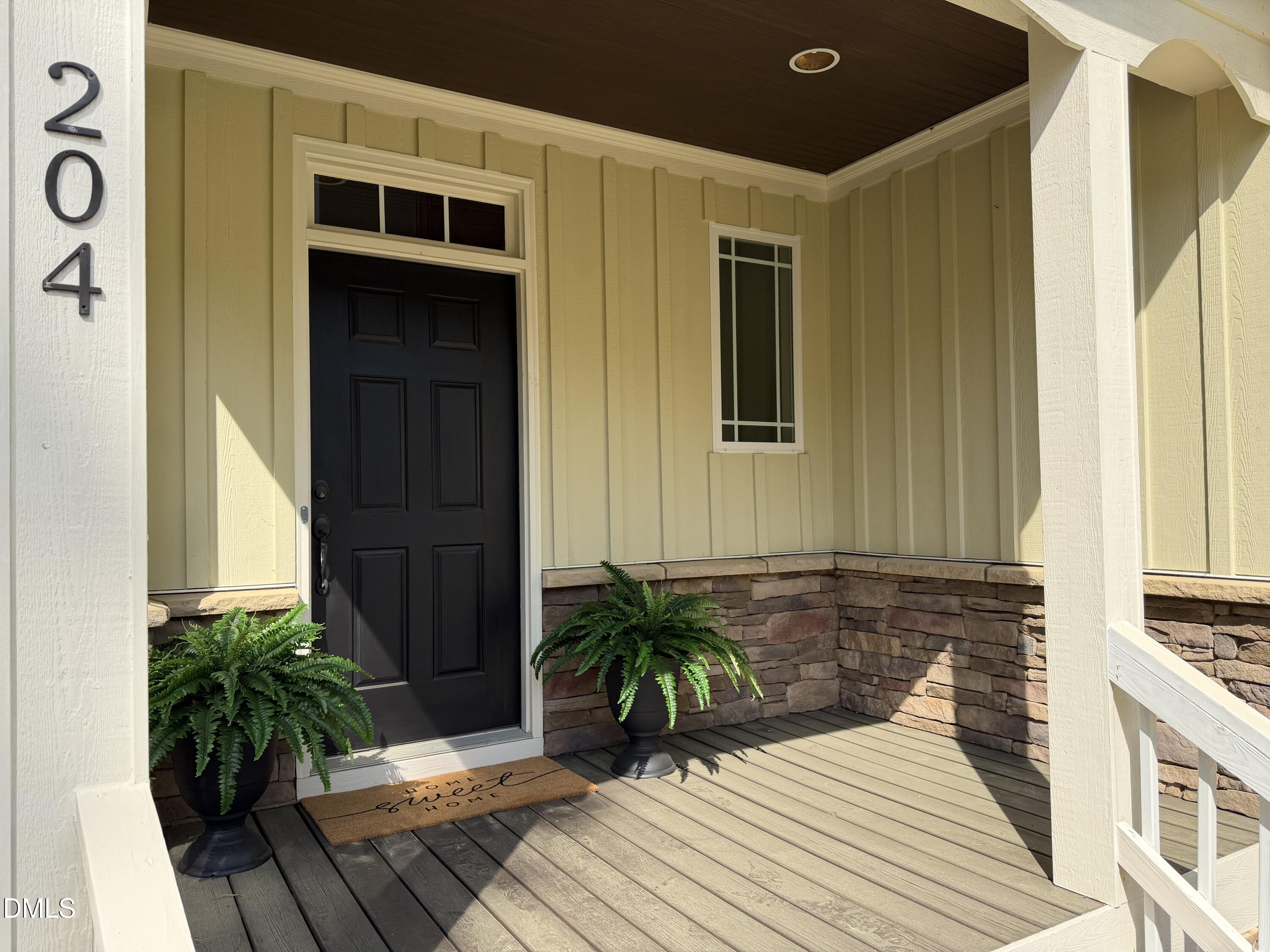 204 Blair Hills Road Wendell, NC 27591 - Photo 6 of 52 a view of a entryway door front of house