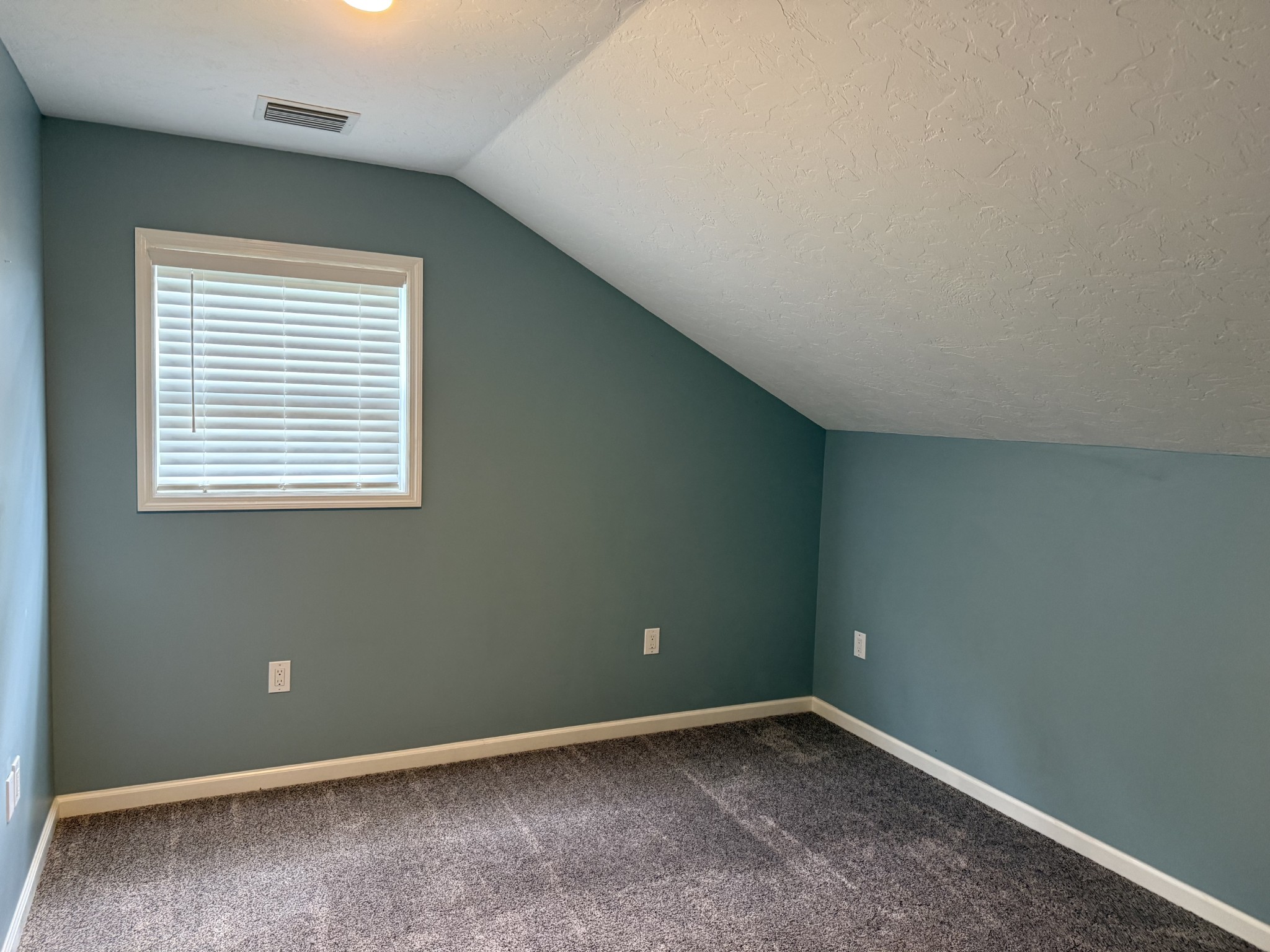 581 Shady Grove Road Bloomington Springs, TN 38545 - Photo 25 of 42 an empty room with a window