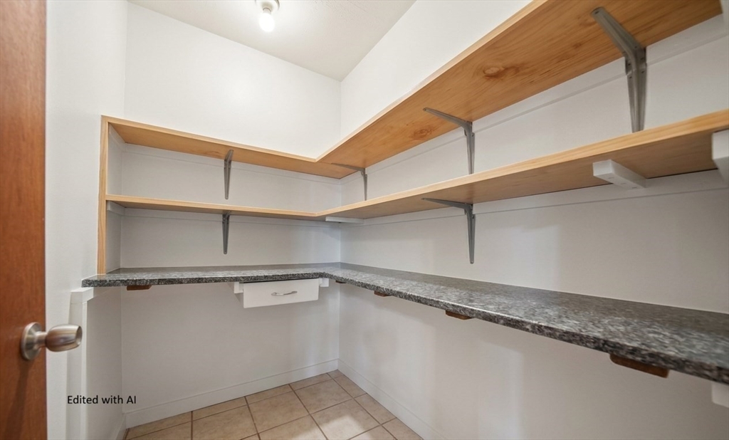 436 Franklin Road Fitchburg, MA 01420 - Photo 31 of 41 a view of a room with racks on the wall