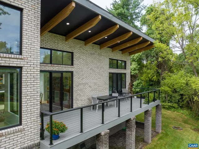 a balcony view with a seating space