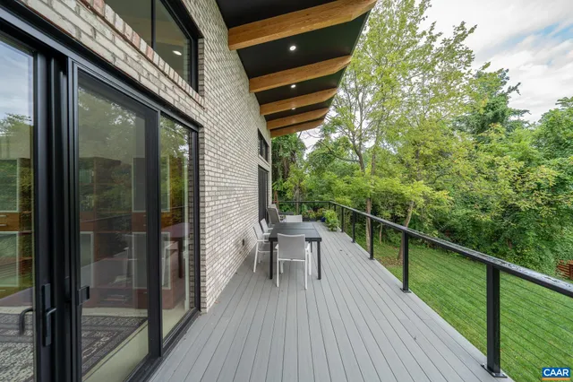 a view of balcony and yard