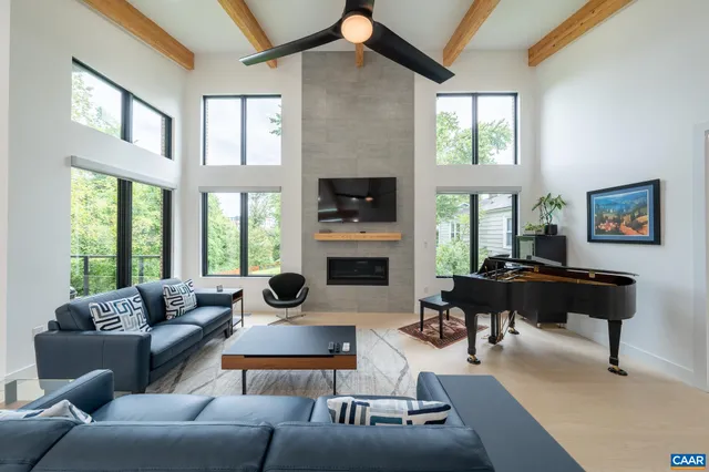 a large kitchen with a table and chairs
