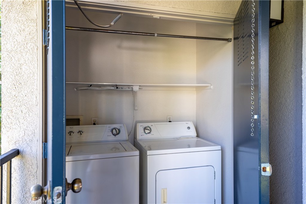 20000 Plum Canyon Road, Unit 1221 Saugus, CA 91350 - Photo 14 of 20 a utility room with dryer and washer