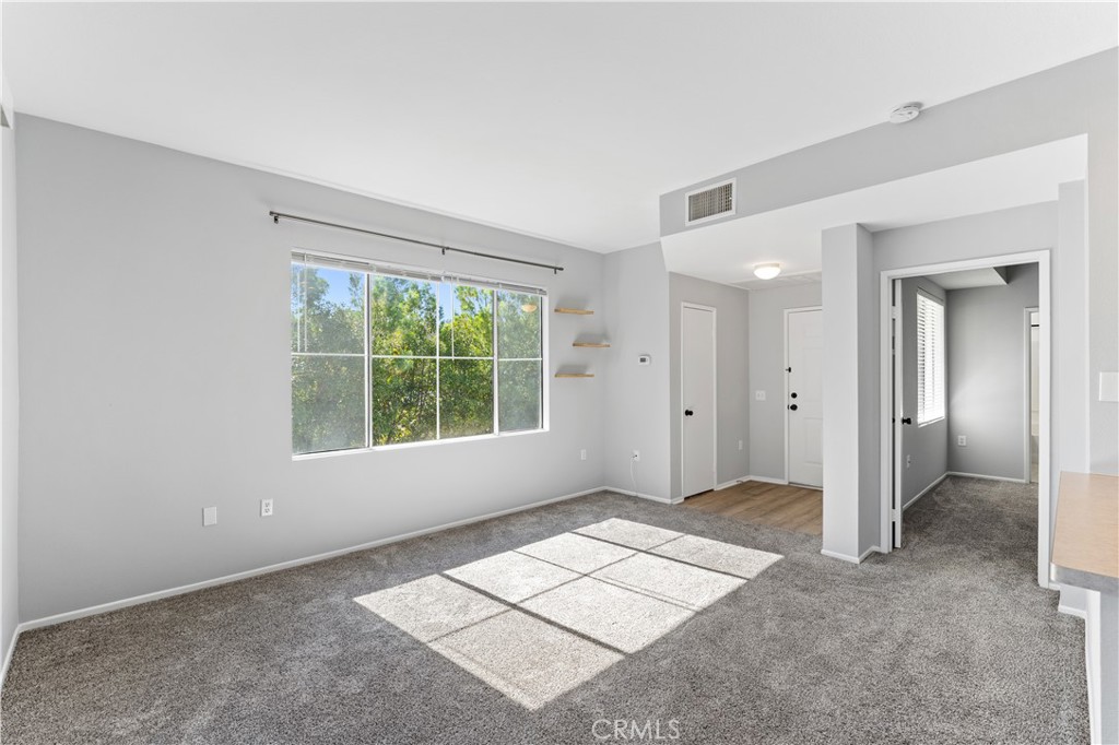 20000 Plum Canyon Road, Unit 1221 Saugus, CA 91350 - Photo 8 of 20 a view of an empty room with window