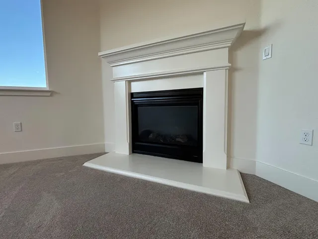 a living room with a fireplace