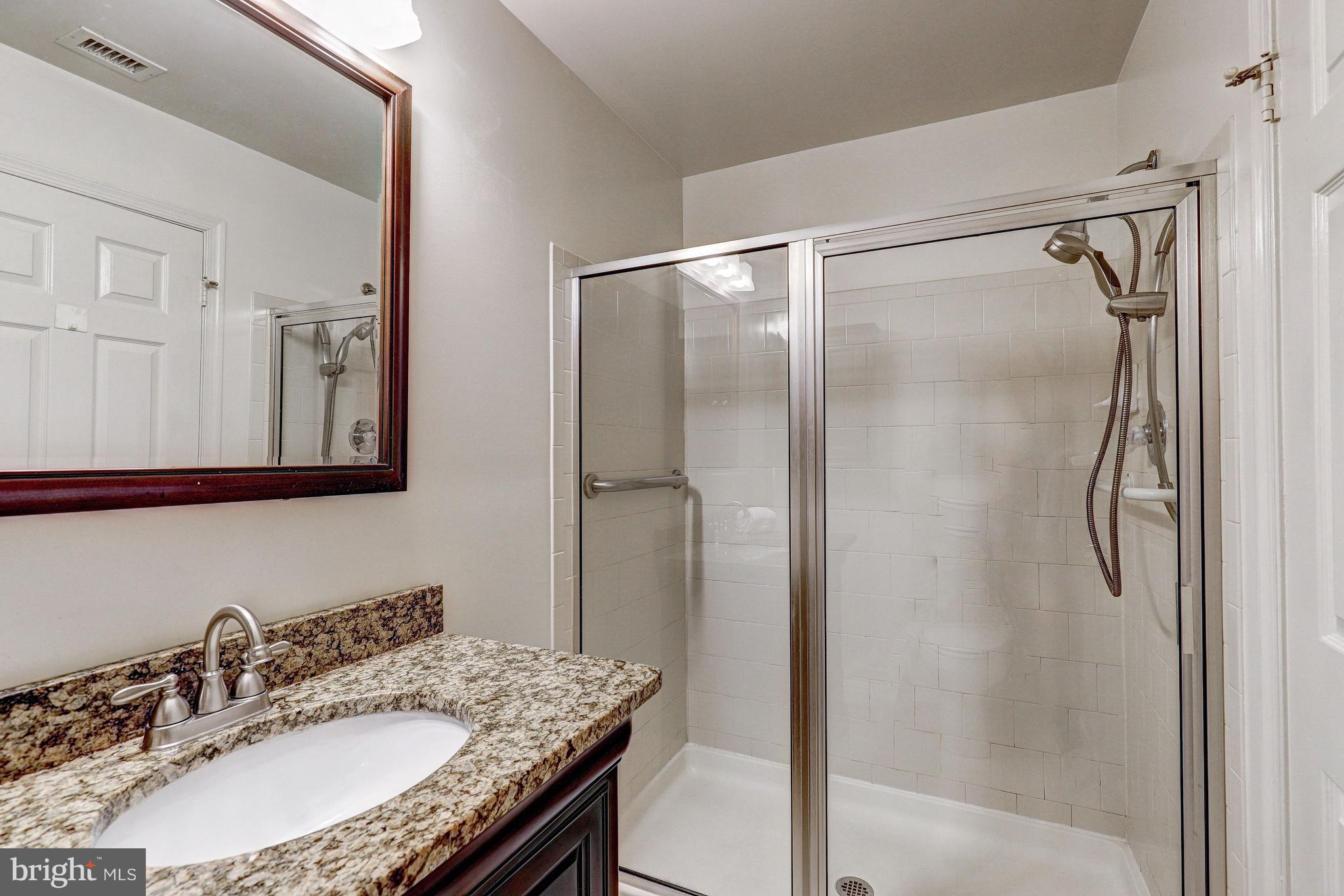 19 Rain Flower Path, Unit 303 Sparks Glencoe, MD 21152 - Photo 20 of 29 Primary Bedroom Suite Bath