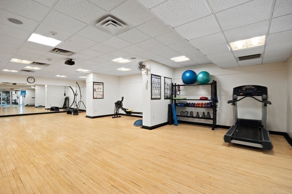 33 Pond Avenue, Unit 709 Brookline, MA 02445 - Photo 27 of 29 a view of a room with gym equipment