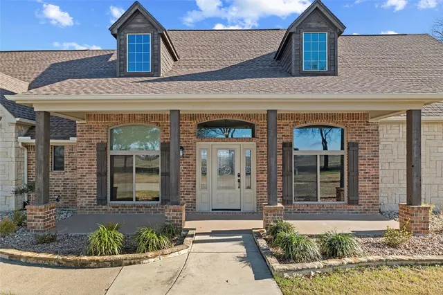 a view of houses with a swimming pool