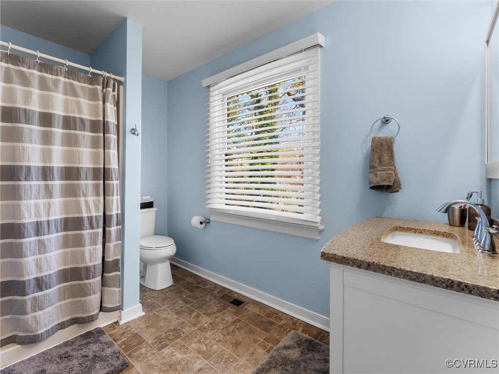3203 Birchbrook Road Henrico, VA 23228 - Photo 23 of 27 Bathroom with toilet and vanity