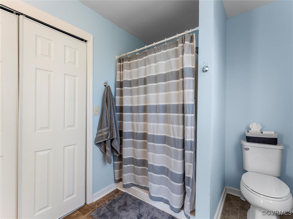 3203 Birchbrook Road Henrico, VA 23228 - Photo 24 of 27 Bathroom featuring a shower with shower curtain an