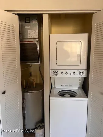 a utility room with dryer and washer