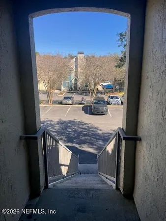 a view of a balcony with an outdoor space