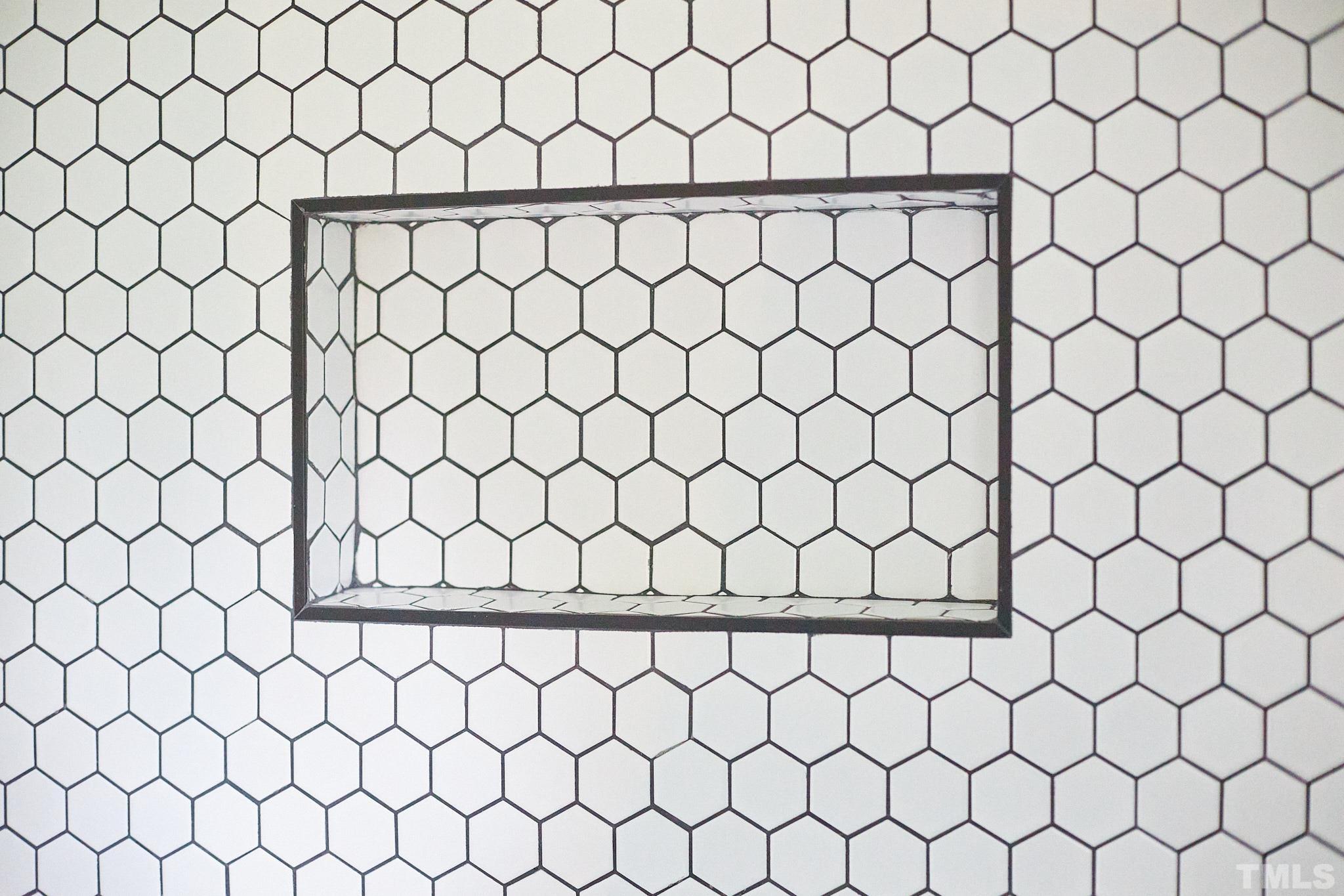 5120 Royal Acres Road Raleigh, NC 27610 - Photo 37 of 60 Timeless hex tiles with a large niche!