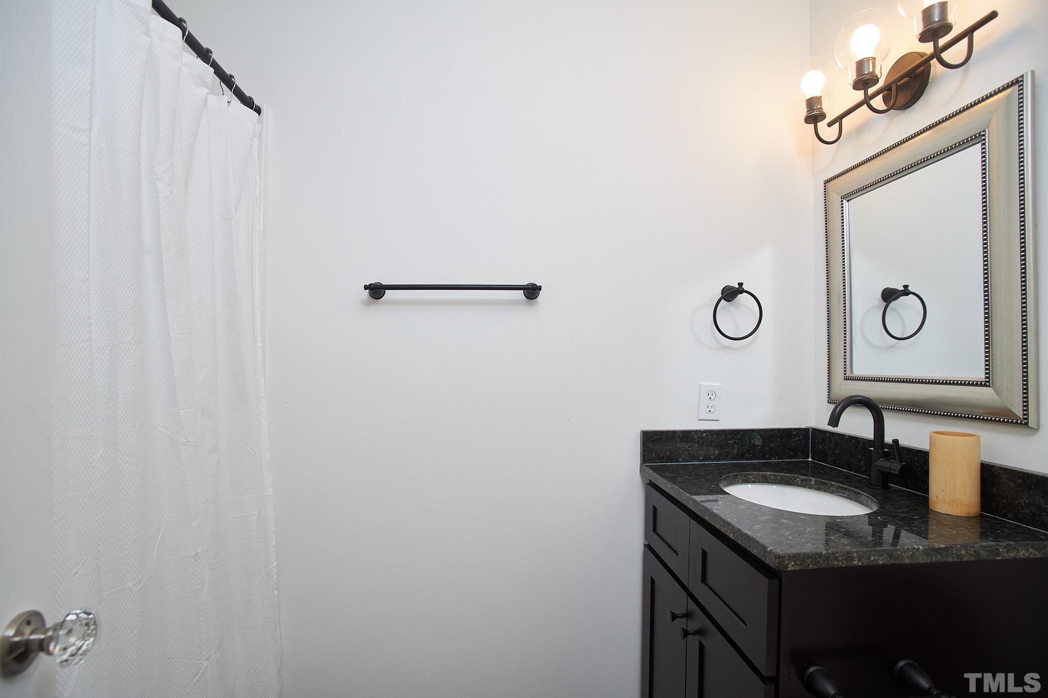 5120 Royal Acres Road Raleigh, NC 27610 - Photo 50 of 60 Larger hall bath!