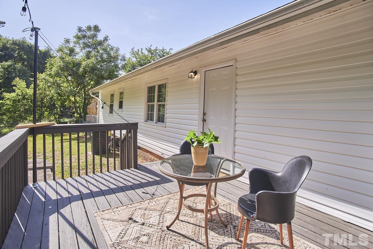 5120 Royal Acres Road Raleigh, NC 27610 - Photo 56 of 60 Large 10 x16 freshly painted deck with installed market lights!