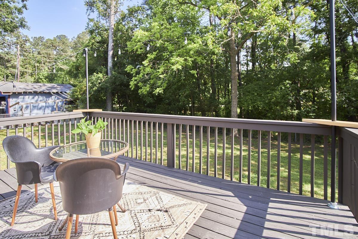 5120 Royal Acres Road Raleigh, NC 27610 - Photo 57 of 60 Private wooded buffer behind fenceline. Relax put your feet up and bask in the sunshine!!