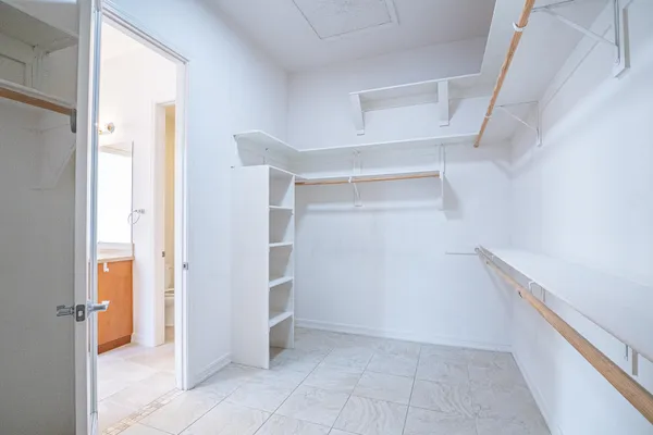 a view of an empty walk in closet