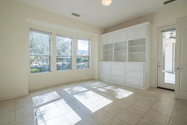 an empty room with windows