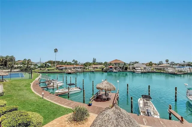 a view of a lake with a house in the background