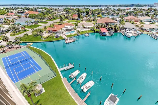 an aerial view of a house with a ocean view