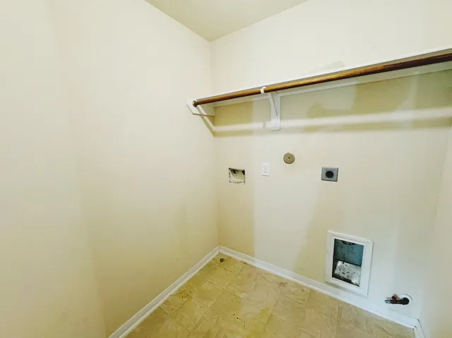 a bathroom with a shower and a sink