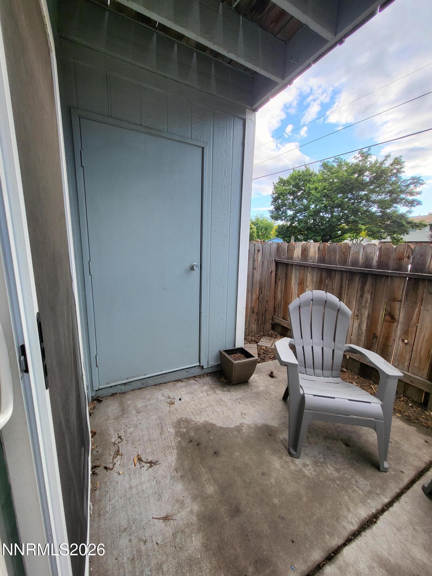 4606 Neil Road, Unit 197 Reno, NV 89502 - Photo 14 of 26 a view of porch with a chair and swing