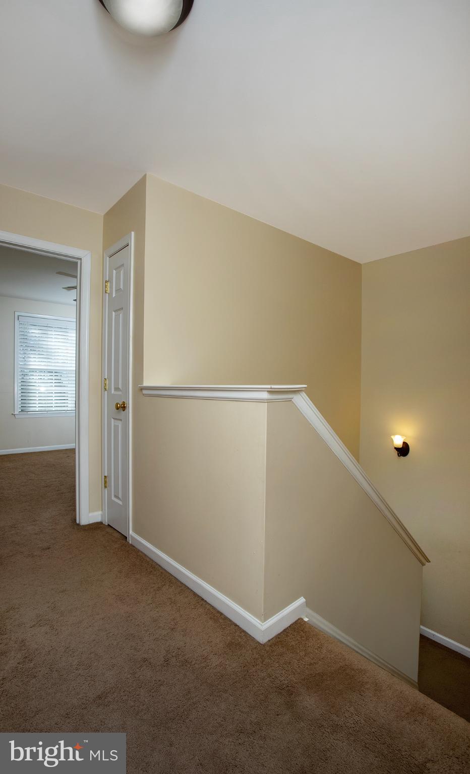 135 Mapleton Boulevard Harrisburg, PA 17112 - Photo 20 of 45 Inviting staircase with warm, neutral tones.