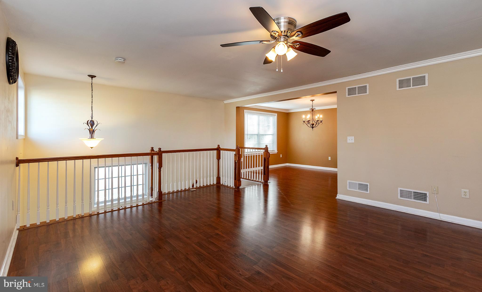 135 Mapleton Boulevard Harrisburg, PA 17112 - Photo 25 of 45 Spacious, sunlit living area with elegance.