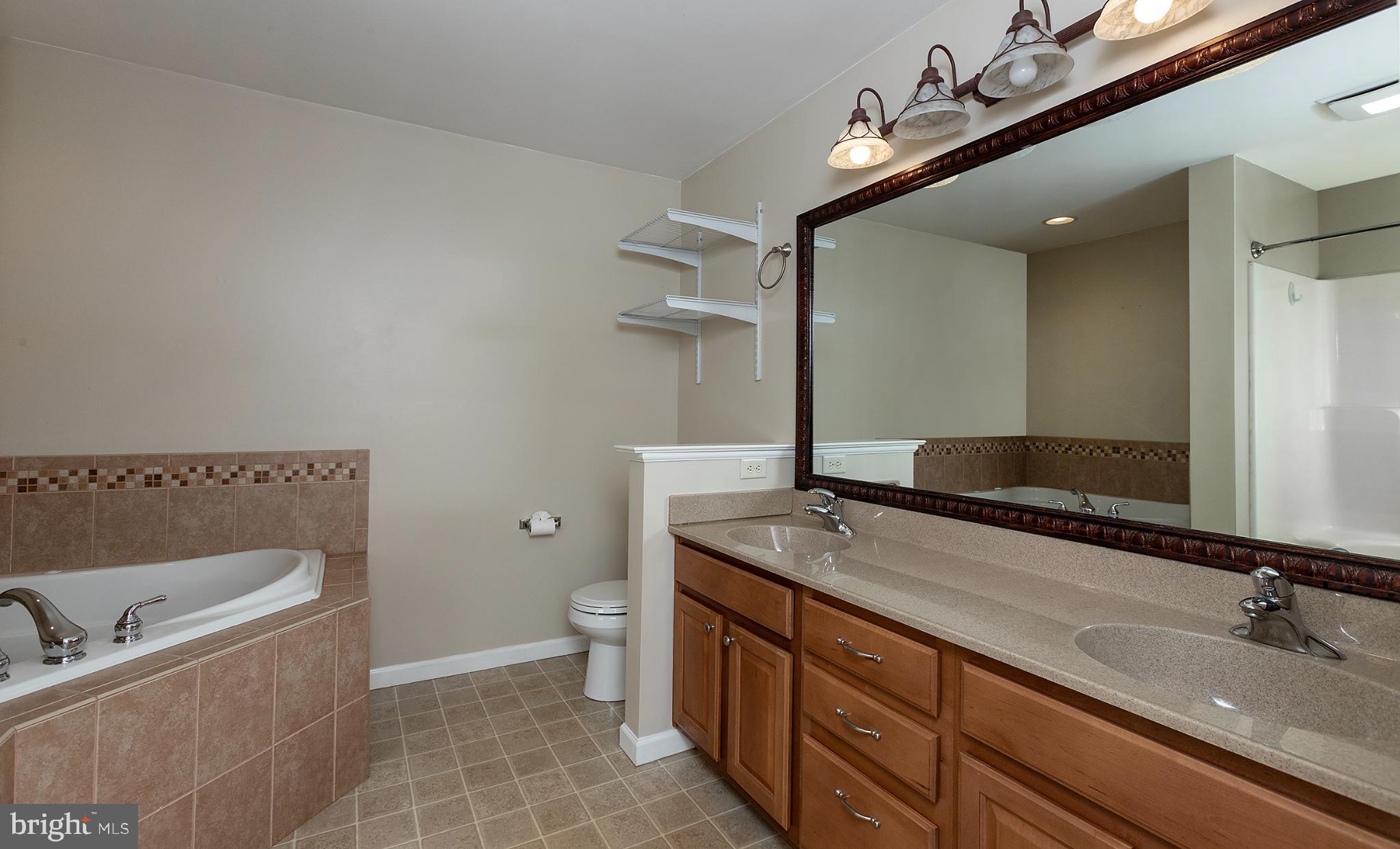 135 Mapleton Boulevard Harrisburg, PA 17112 - Photo 34 of 45 Spacious bathroom with elegant finishes.