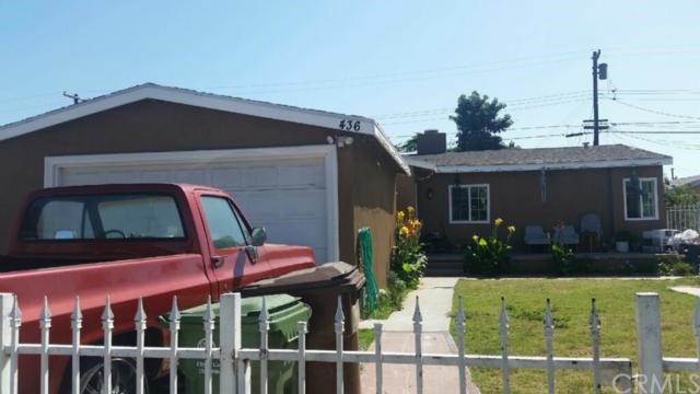 a front view of house with yard