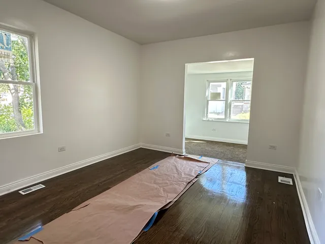 a view of an empty room and window