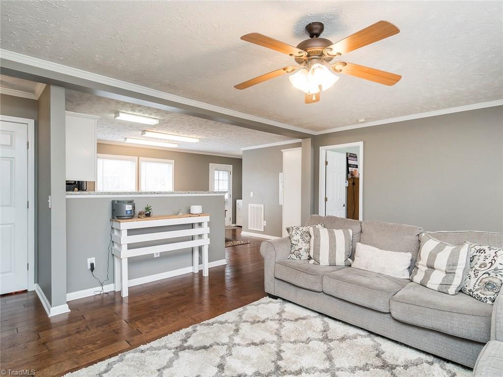500 Vernon Road Reidsville, NC 27320 - Photo 24 of 24 The home offers an open concept with the living room open to the kitchen. The home also offers a split floor plant. Notice the ceiling fans!