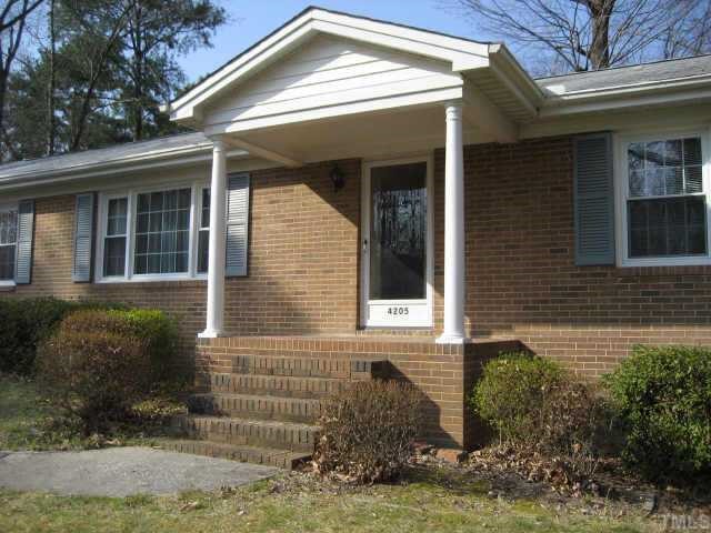 4205 Jane Lane Raleigh, NC 27604 - Photo 5 of 5 a view of a house with a yard