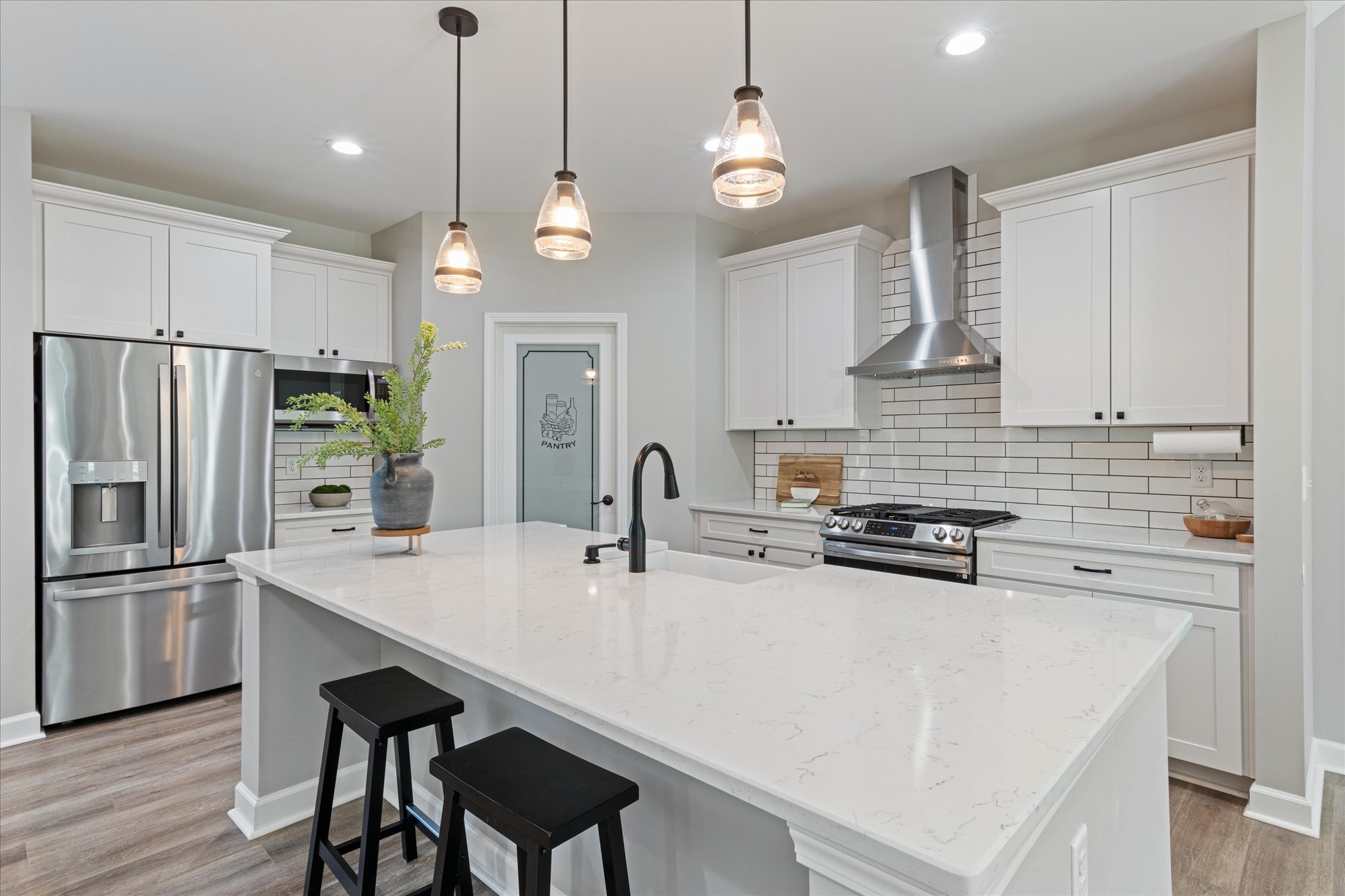 1397 Taylortown Road White Bluff, TN 37187 - Photo 12 of 26 a kitchen with stainless steel appliances granite countertop a sink a stove a refrigerator and island
