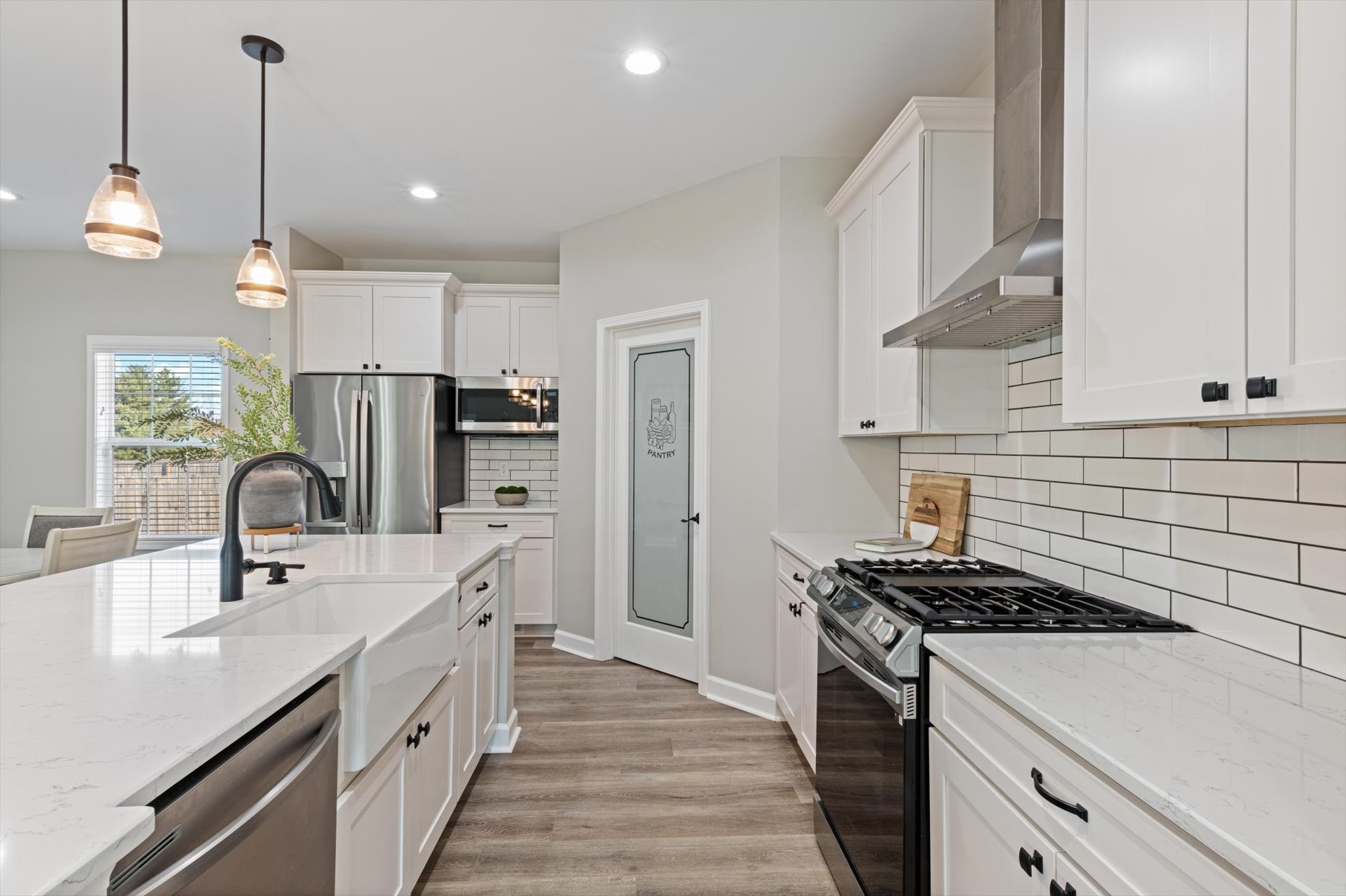 1397 Taylortown Road White Bluff, TN 37187 - Photo 13 of 26 a kitchen with a sink stove and refrigerator