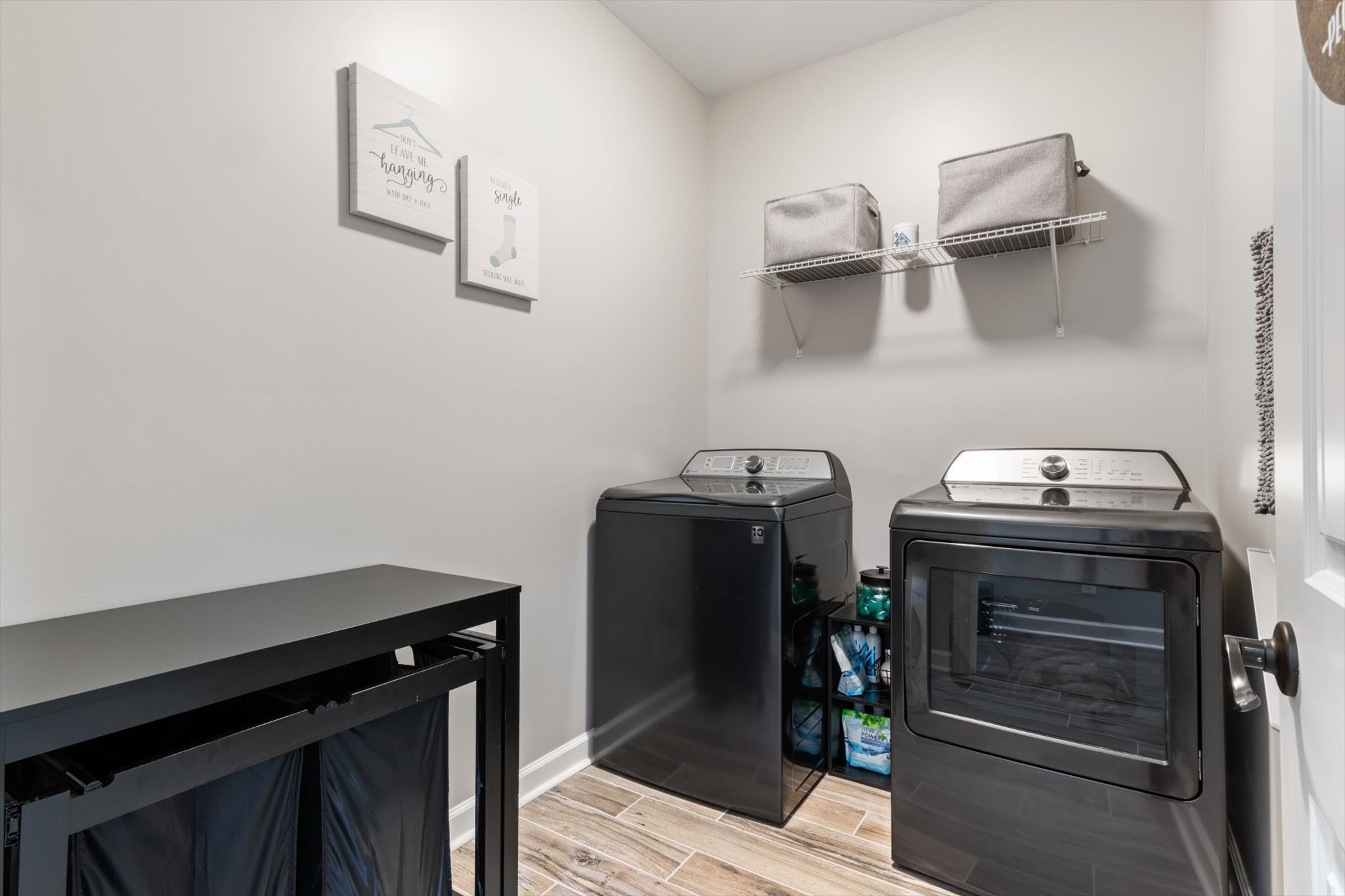 1397 Taylortown Road White Bluff, TN 37187 - Photo 15 of 26 a view of storage and utility room with racks on the wall
