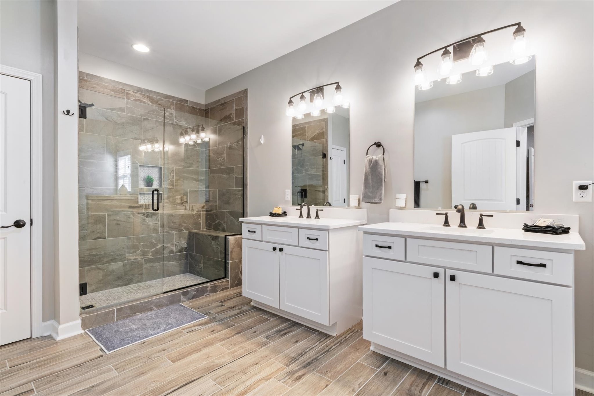 1397 Taylortown Road White Bluff, TN 37187 - Photo 18 of 26 a bathroom with a double vanity sink mirror and shower