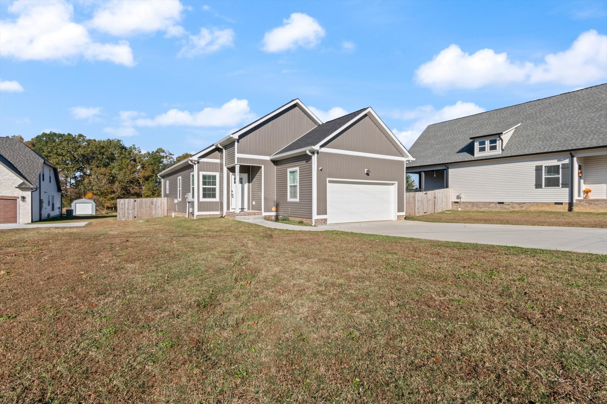 1397 Taylortown Road White Bluff, TN 37187 - Photo 2 of 26 a view of a house with a yard and potted plants