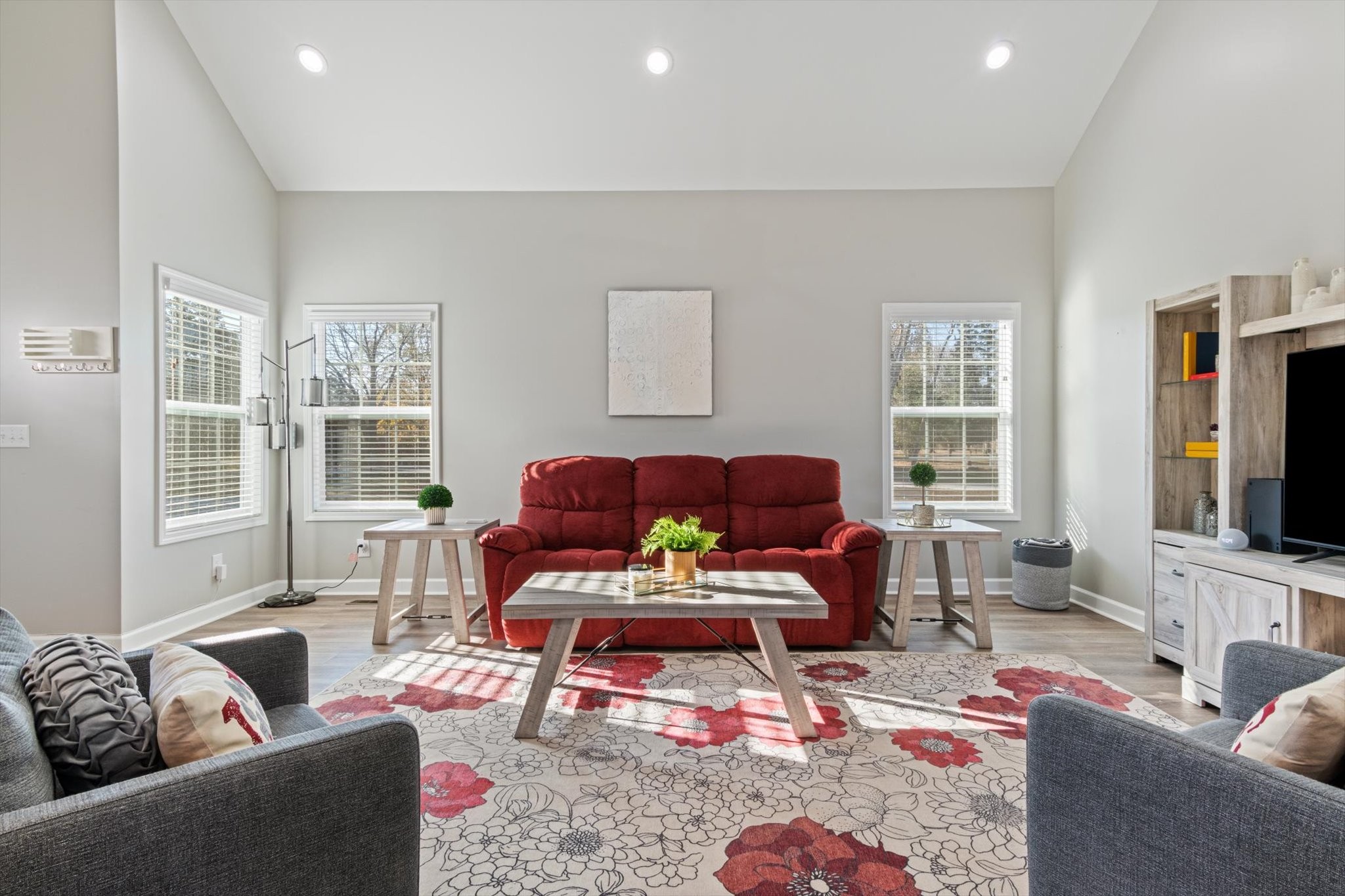 1397 Taylortown Road White Bluff, TN 37187 - Photo 6 of 26 a living room with furniture a flat screen tv and windows