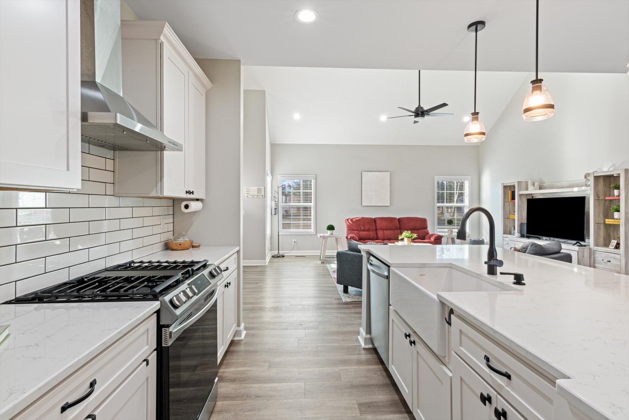 1397 Taylortown Road White Bluff, TN 37187 - Photo 10 of 26 a kitchen with counter top space a sink stainless steel appliances and cabinets