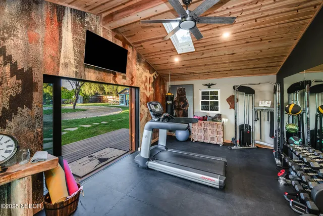 a outdoor space with patio couch and a garden