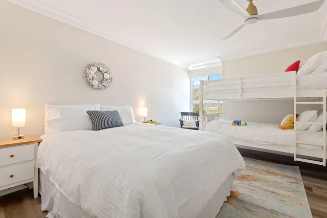 a bedroom with a bed and a cabinets