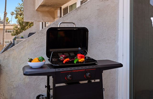 a bathroom with a sink mirror vanity and toilet