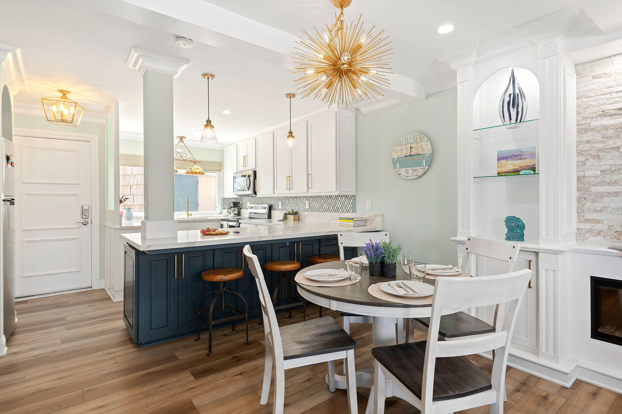 Undisclosed Address Carpinteria, CA 93013 - Photo 4 of 22 a view of a dining room with furniture and wooden floor
