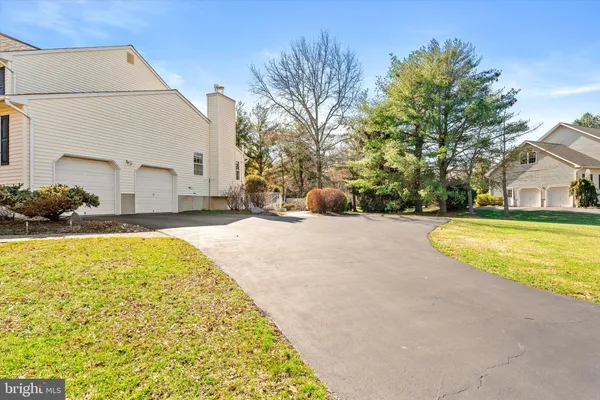 a view of swimming pool with outdoor seating