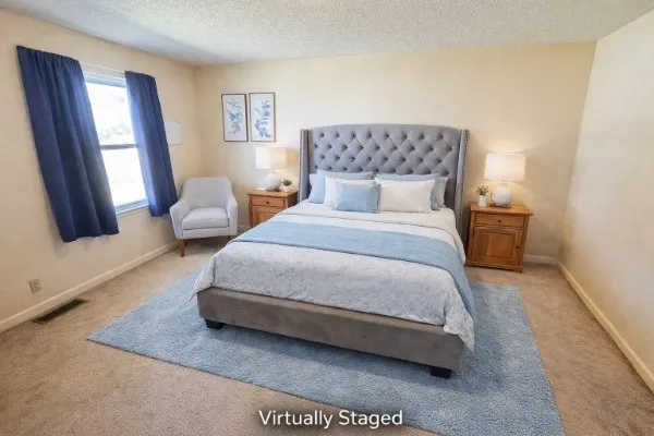 a bedroom with a bed and window
